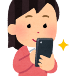スマホで写真を撮る女性のイラスト